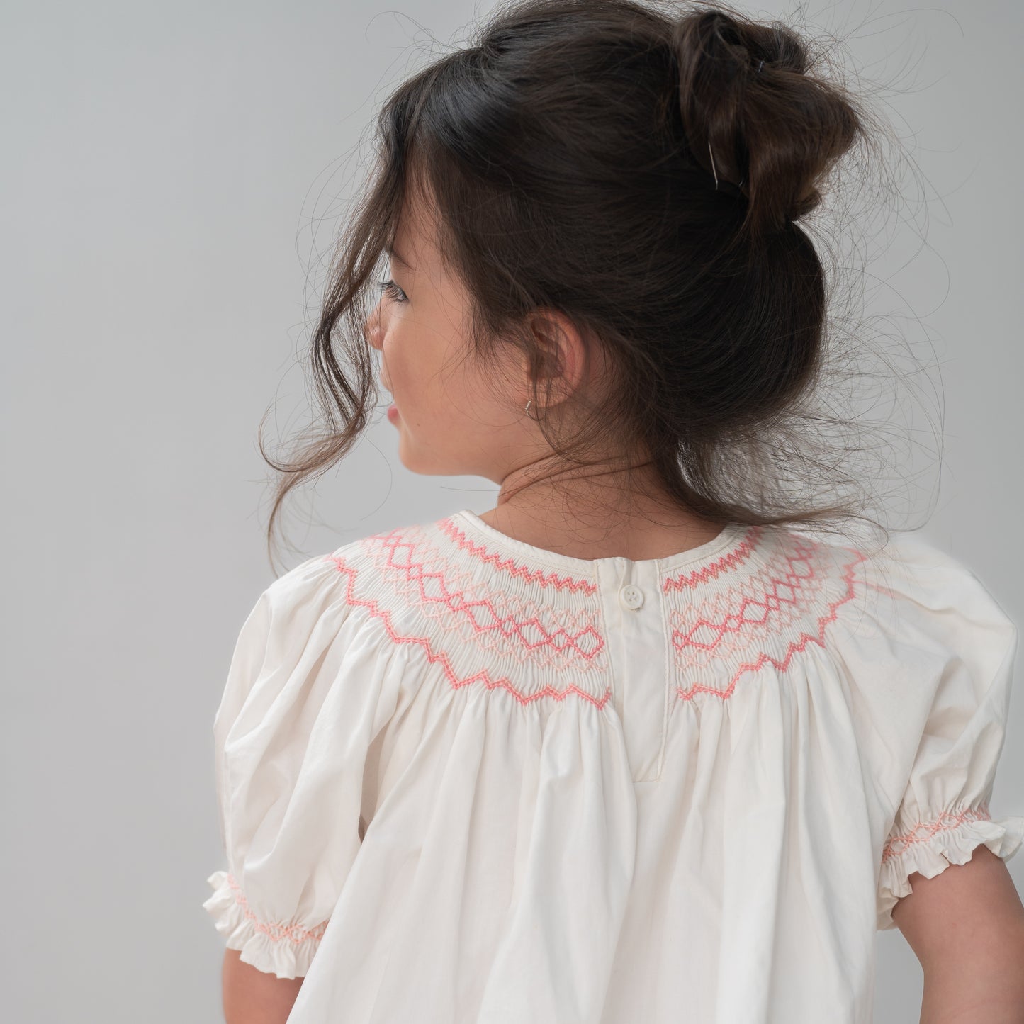 The best embroidery dress by Bion Bea, highly skilled artist create gracefull dress with pink flowers